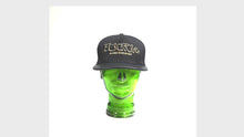 Load and play video in Gallery viewer, BLACK &amp; GOLD, EXCLUSIVE LEATHER PEAK STRAPBACK
